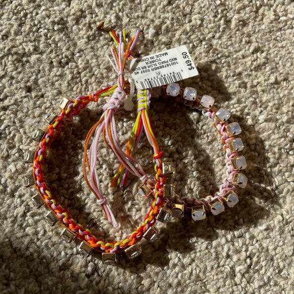 On 34th Set of two adjustable bracelets with rhinestones, one pink, one clear - Picture 1 of 3